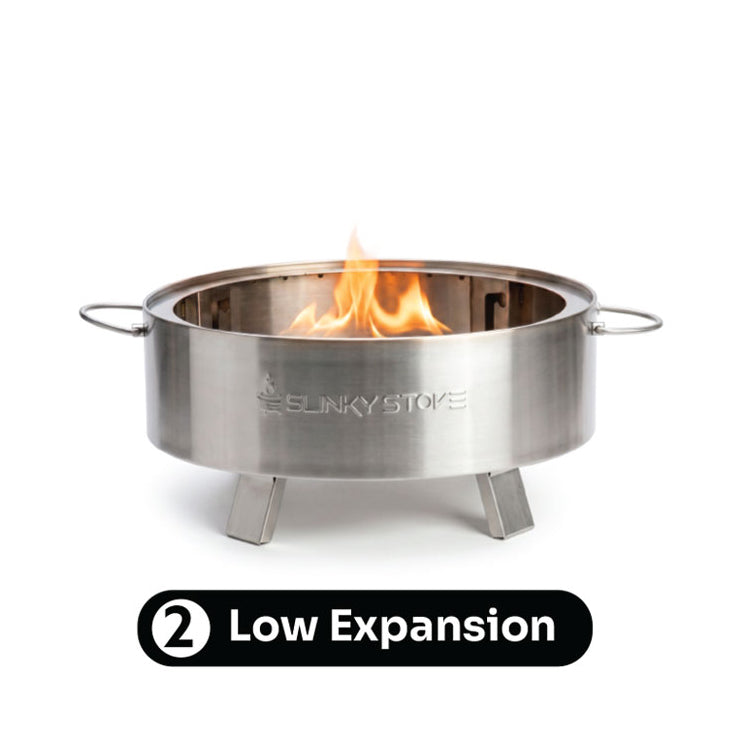Slinky Stove fire pit at its low 10-inch expansion level with flames.