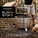 Man mounting the Slinky Stove 23-inch collapsible pizza oven onto the Slinky Stove Fire Pit at a campsite. Fire pit sold separately.